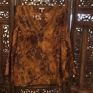 Sheer long sleeve blouse with hues of brown